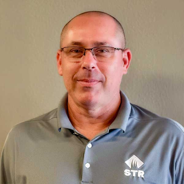 Bart_STR_Staff White male with glasses and a grey shirt