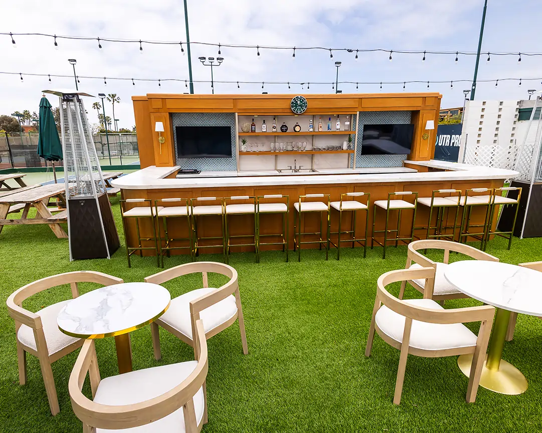 Outdoor mall with artificial grass and people on the grass